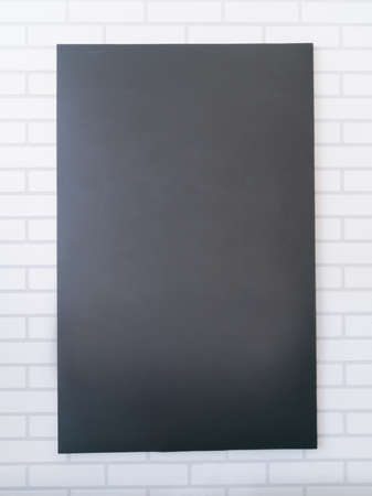 portrait orientation blank billboard on modern white wallの写真素材