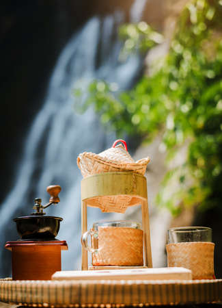 Small retro coffee drip set with natural backgroundの写真素材