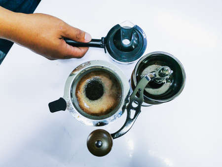Hand drip coffee, Barista making drip coffee. Top viewの写真素材