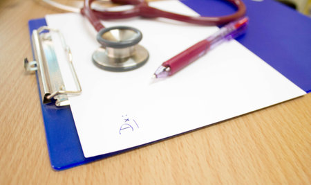 Medical record with stethoscopeの写真素材