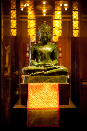CHIANG RAI, THAILAND - October 23, 2010: Buddha statue at Wat Phrakaew, Chiang Rai, Thailand.のeditorial素材