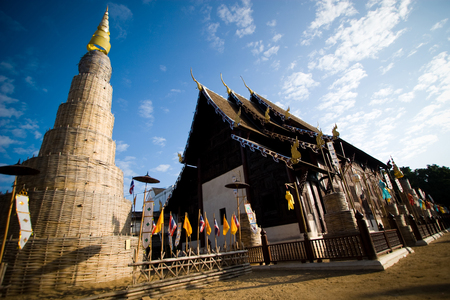Chiangmai, Thailand - December 1, 2010: Wat Chedi Luang temple with morning sunlight and blue sky at Chiangmai, Thailand.の写真素材