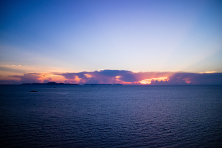 Beautiful sunset in the sea in twilight time. View from high building.の写真素材