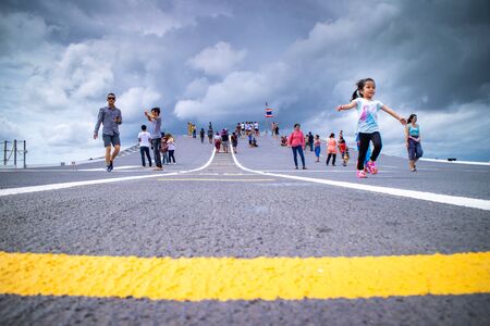 Chonburi / Thailand - July 30, 2018: People are walking and touring on HTMS Chakri Naruebet, the flagship and aircraft carrier battleship of the Royal Thai Navy.のeditorial素材