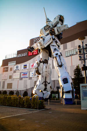 Tokyo / Japan - March 15, 2019: Full scale, full sized of Unicorn Gundam (RX-0) statue in front of Diver City Plaza Tokyo, Odaiba.のeditorial素材