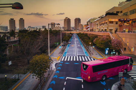 Tokyo / Japan - March 15, 2019: Road in the front of Aqua City at Odaba, Tokyo in the evening sunset.のeditorial素材