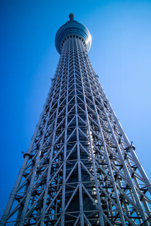 Tokyo Skytree at Tokyo, Japan. Close up view with blue sky from below.