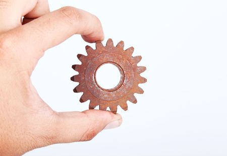 Conceptual image of industry, wheel on handの写真素材