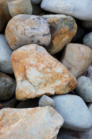 Texture of large rocks, brown and gray abstract backgroundの写真素材