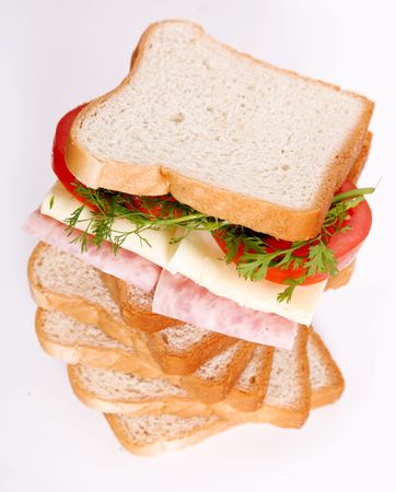 Sandwich with cheese, ham and tomatoes. Food imageの写真素材