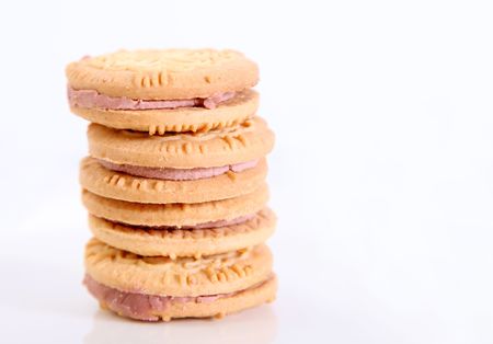 Tower of sweet cookies on a white backgroundの写真素材