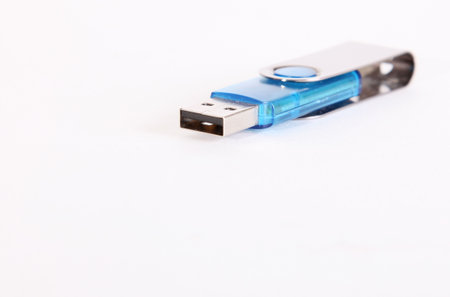 Blue usb memory over white background. Technology image. Space to insert text or designの写真素材