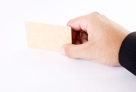 Business man hand with business card over white backgroundの写真素材