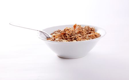 Fiber cereal on white dish. Breakfast foodの写真素材