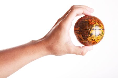 Old world in the hand of a man. White background の写真素材