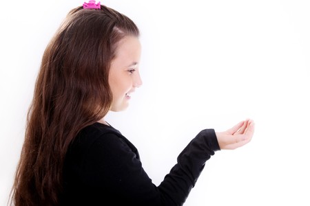 Beauty girl with space to insert a product in handの写真素材