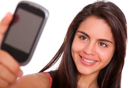 Woman taking a photo with his cell phoneの写真素材