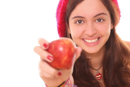 woman giving an apple as a sign of sharing and happinessの写真素材