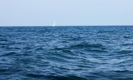 beatiful blue sea with ship in the distance ladscape. photographyの写真素材