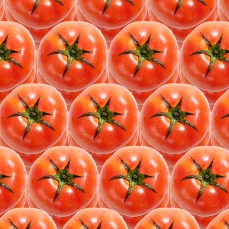background of large and red tomatoes forming a lineの写真素材