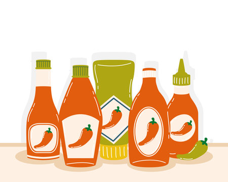 Hot chili pepper sauce bottles design of spicy vegetable and food theme Vector illustrationのイラスト素材