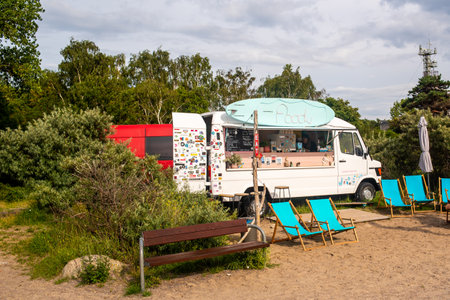 Hel, Pomeranian, Poland - 07.25.2023: Food truck on the beach of Hel town, Polandのeditorial素材