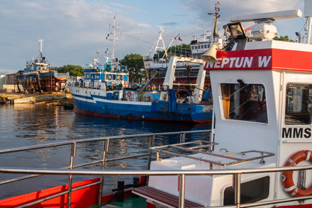 Wladyslawowo, Pomeranian, Poland - July 27, 2023: Ships in the port on a summer day.のeditorial素材