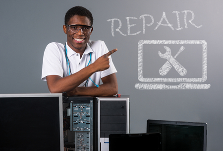 Technician, computers and repair signの写真素材