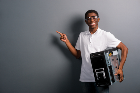 Good-looking man holding computerの写真素材