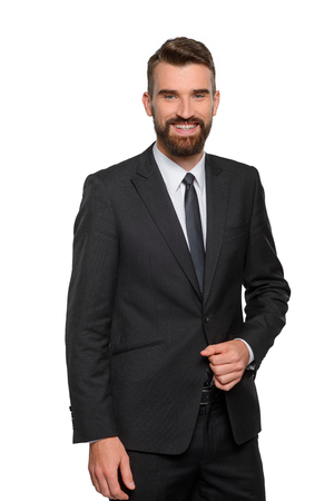 Laughing handsome businessman with accurate beardの写真素材