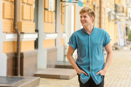 Carefree young man with beautiful smileの写真素材