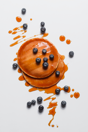 Hot pancakes with scattered blueberriesの写真素材