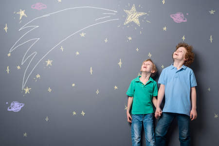 Two brothers gazing at starsの写真素材