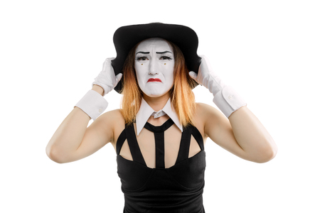 Sad female mime on whiteの写真素材