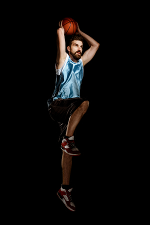 Jumping shot of basketball playerの写真素材