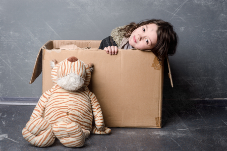 Beautiful girl in paper boxの写真素材