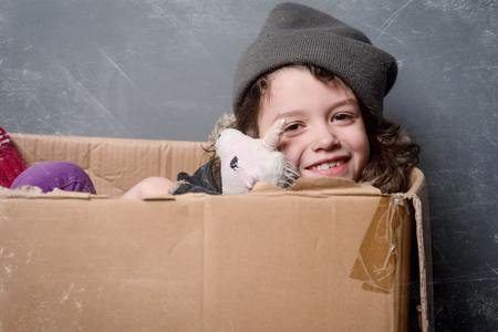 Smiling kid and used toyの写真素材