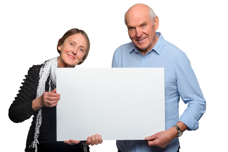 Couple holding canvas for text.の写真素材