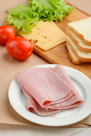 Ham, tomato, cheese, lettuce, breadの写真素材
