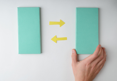 Hand puts a rectangleの写真素材