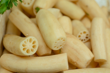 Tray of fresh lotus rootsの写真素材