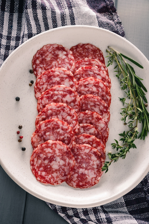 Salami slices with seasoningの写真素材