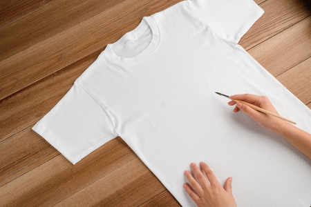 Painting on a white t-shirtの写真素材