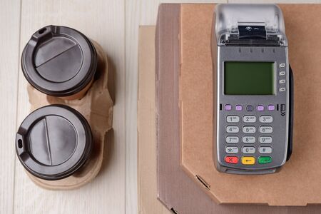 Coffee, pizza and POS terminalの写真素材