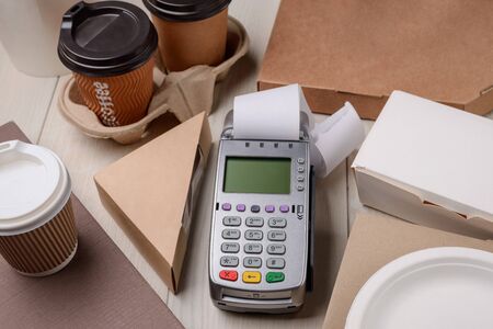 Paying for coffee and foodの写真素材