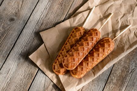 Waffle sticks on wooden tableの写真素材