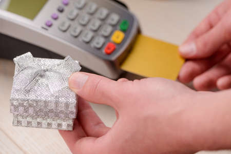 Man holding a gift boxの写真素材