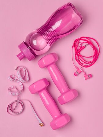 Pink fitness accesories on backgroundの写真素材