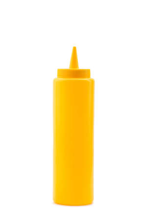 Yellow squeeze bottle isolated on white backgroundの写真素材