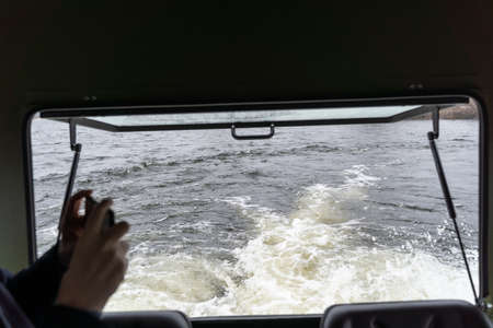 View from a cockpit on seething streams of waterの写真素材